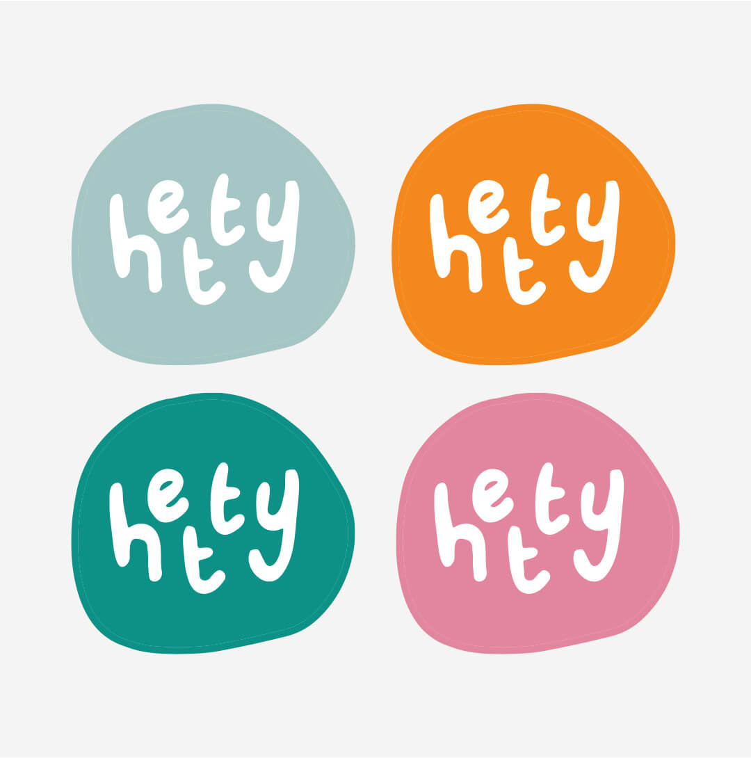 Four colorful circles with 'hey' text on a light gray background