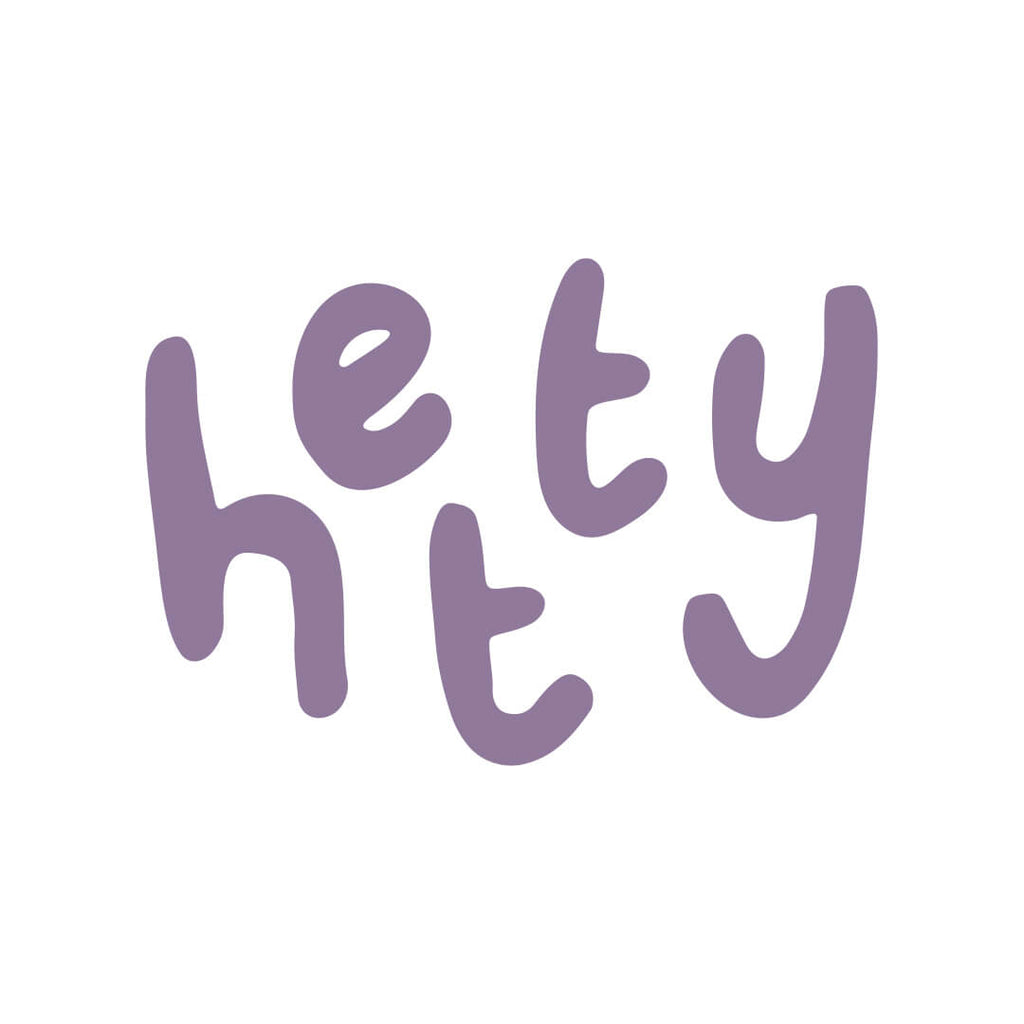 Purple 'hety' text on a white background
