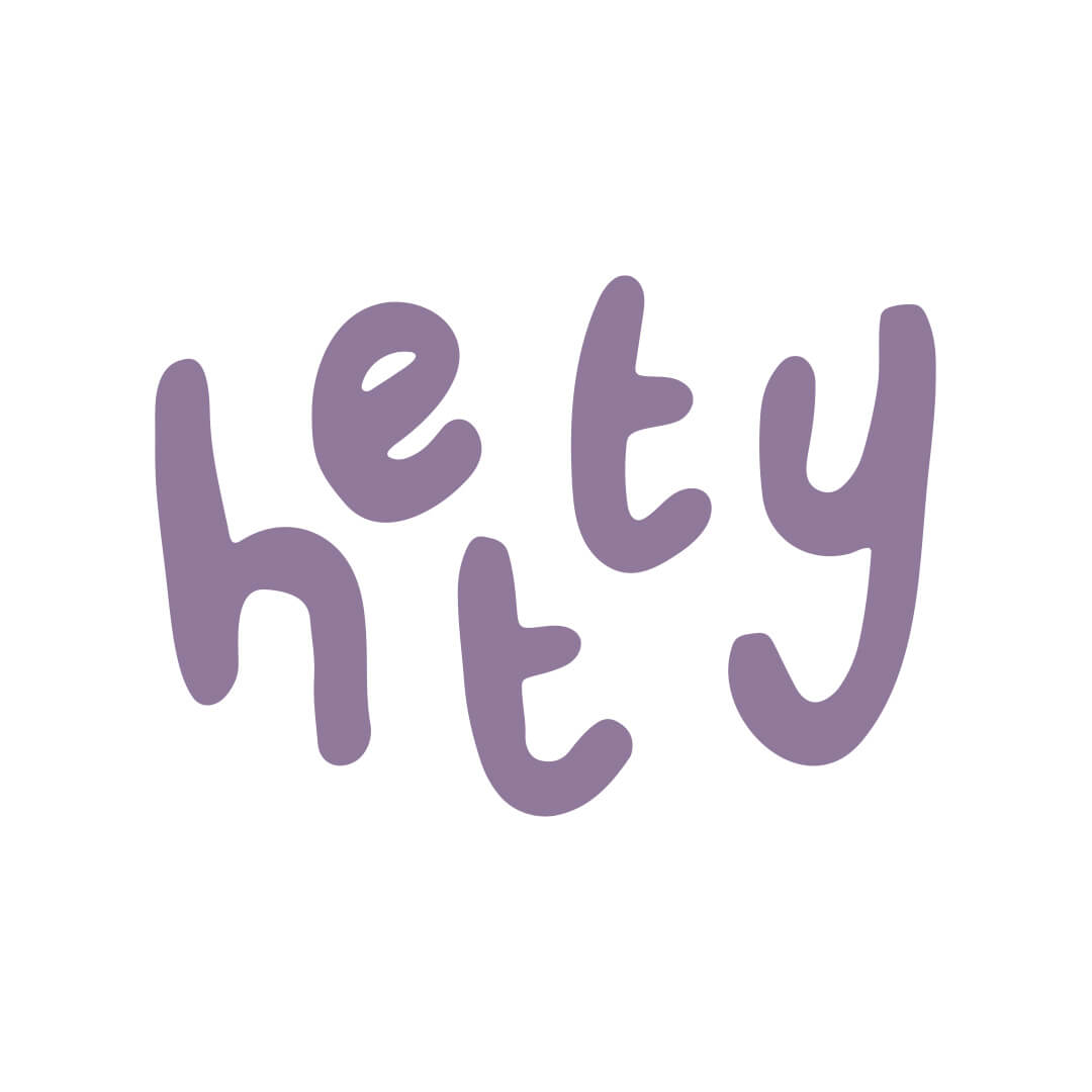 Purple 'hety' text on a white background